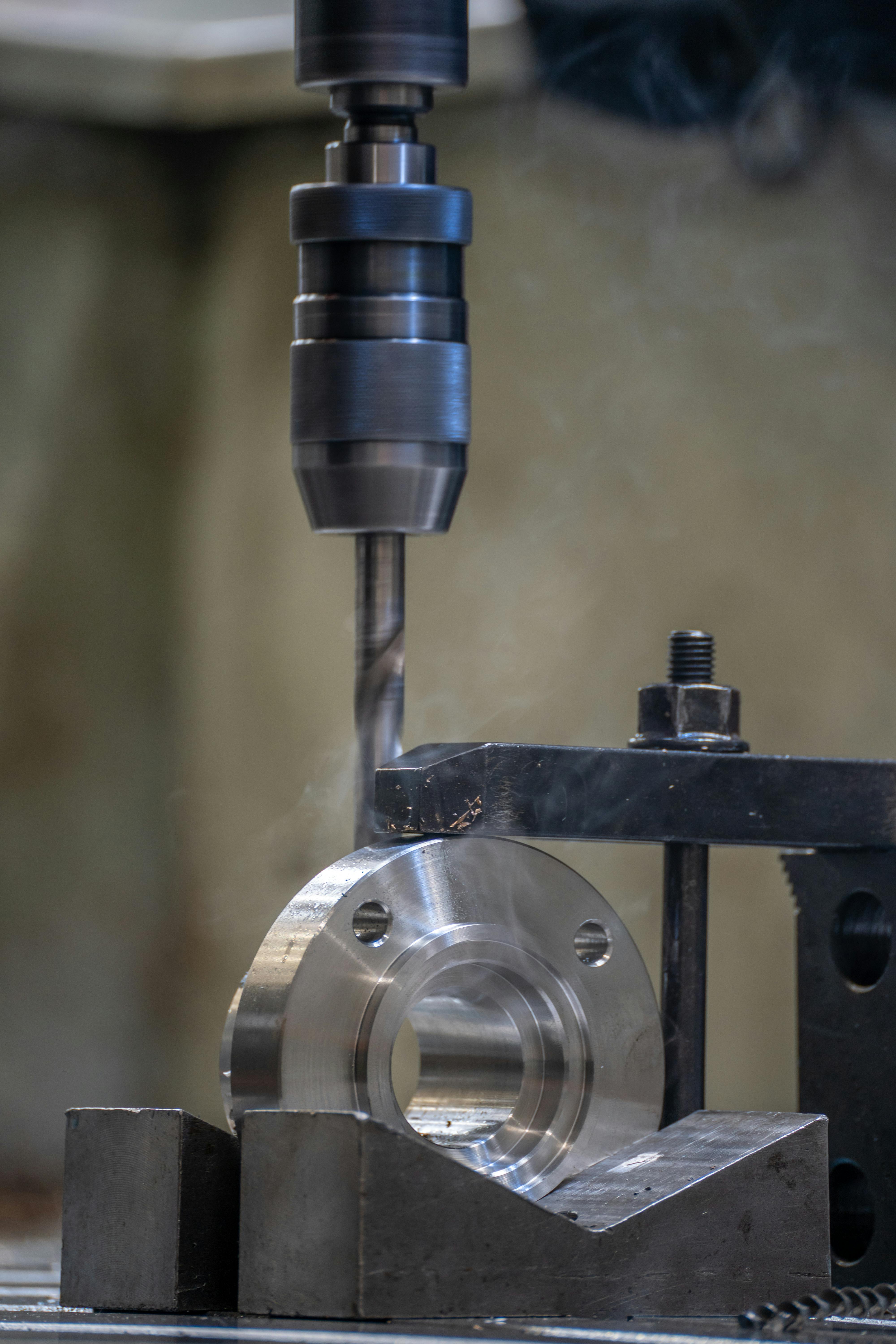 Multi-axis CNC milling center creating complex geometry parts for aerospace applications